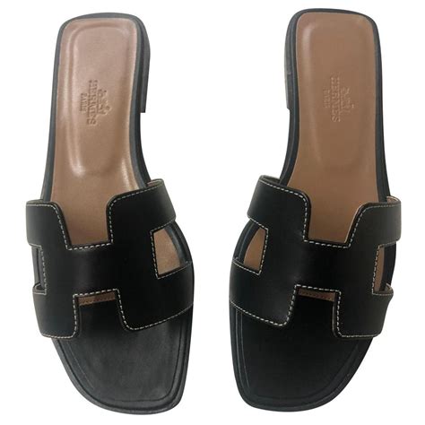 hermes oran black sandals|where to buy Hermes sandals.